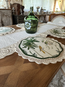 Tovaglietta Rotonda Vinile Con  Decorazione Palme E Uccelli